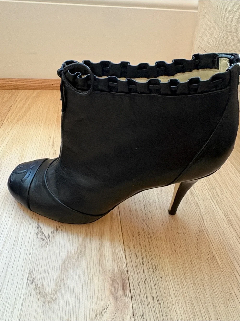 CHANEL Black Leather Ankle Booties with Bow-Trim and CC Toe